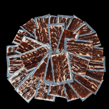 Jamón bellota ibérico 100% raza ibérica cortado a cuchillo.
